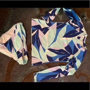 Sporty rash guard style swimsuit.